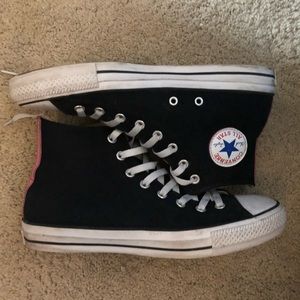 Black and pink high top converse
